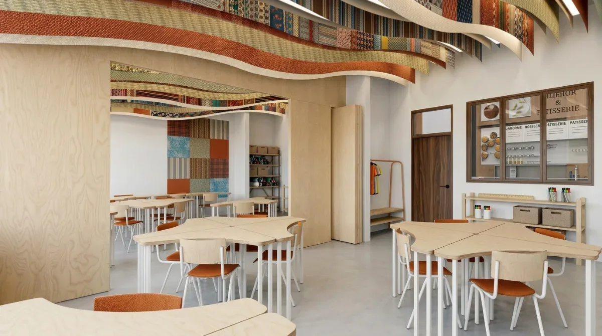 Atelier créatif de la fondation Manoré, tables blanches et étagère de matériaux colorés